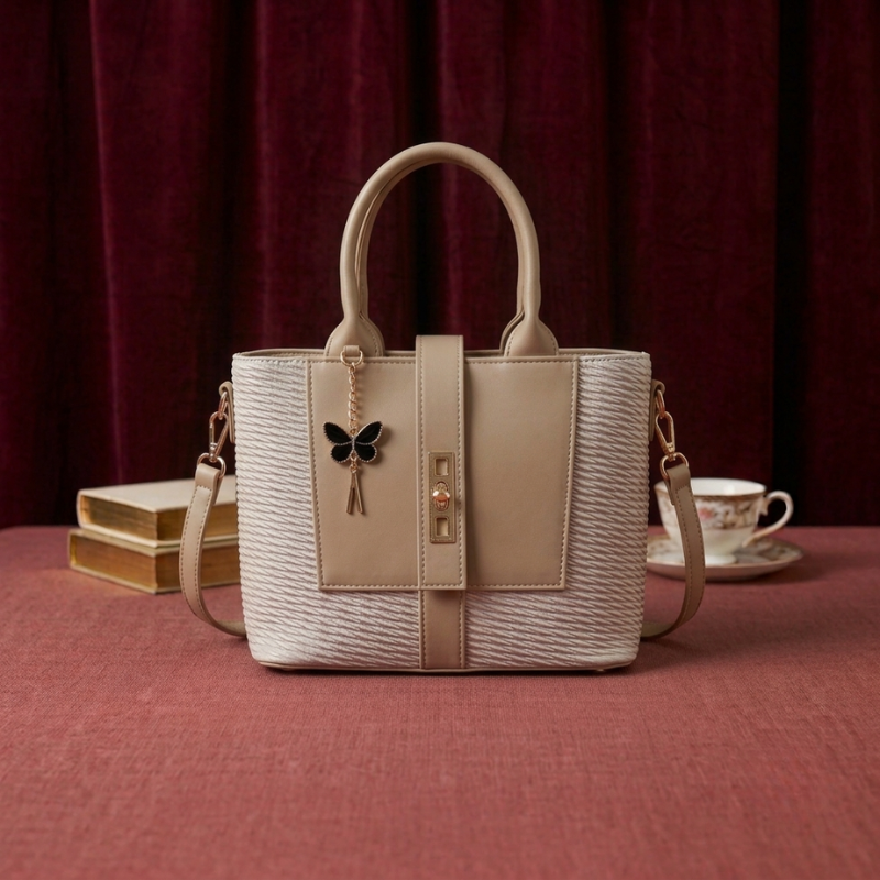 Butterfly charm tote in beige