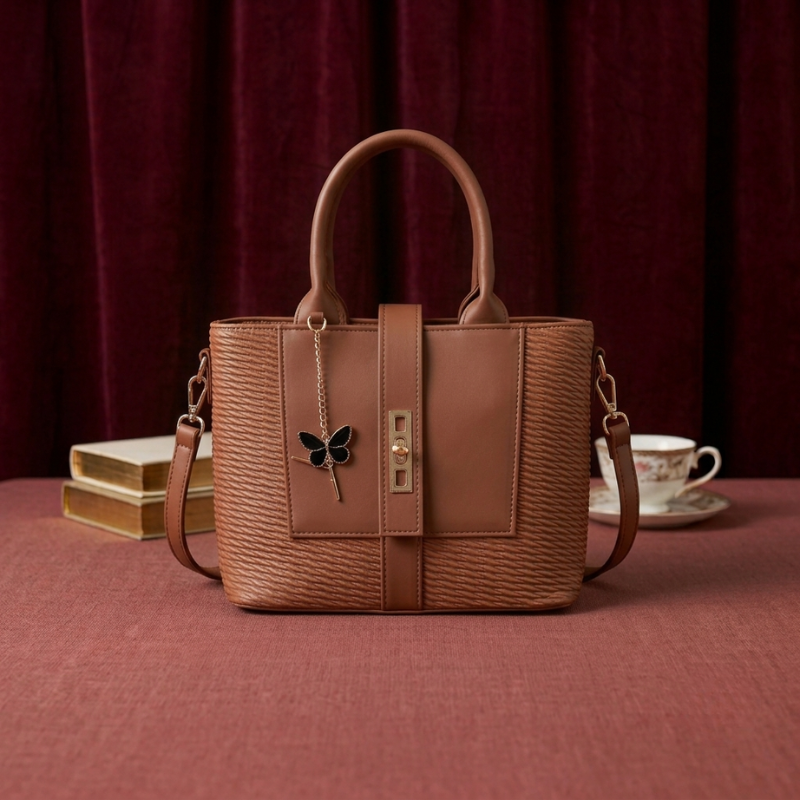 Butterfly charm tote in brown