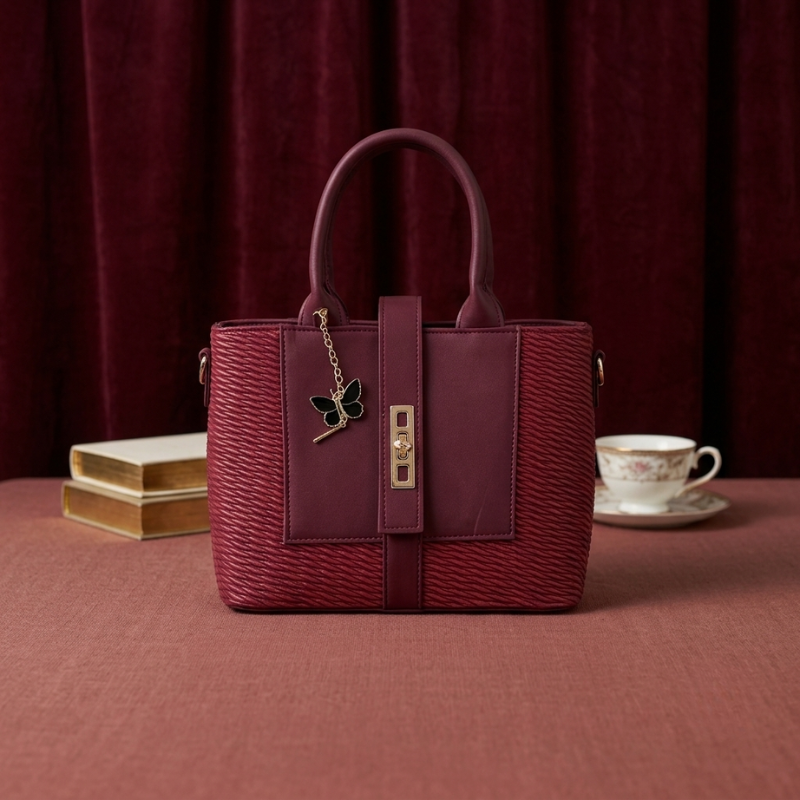Butterfly charm tote in mahroon