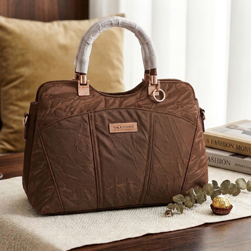 Quilted shoulder bag in brown