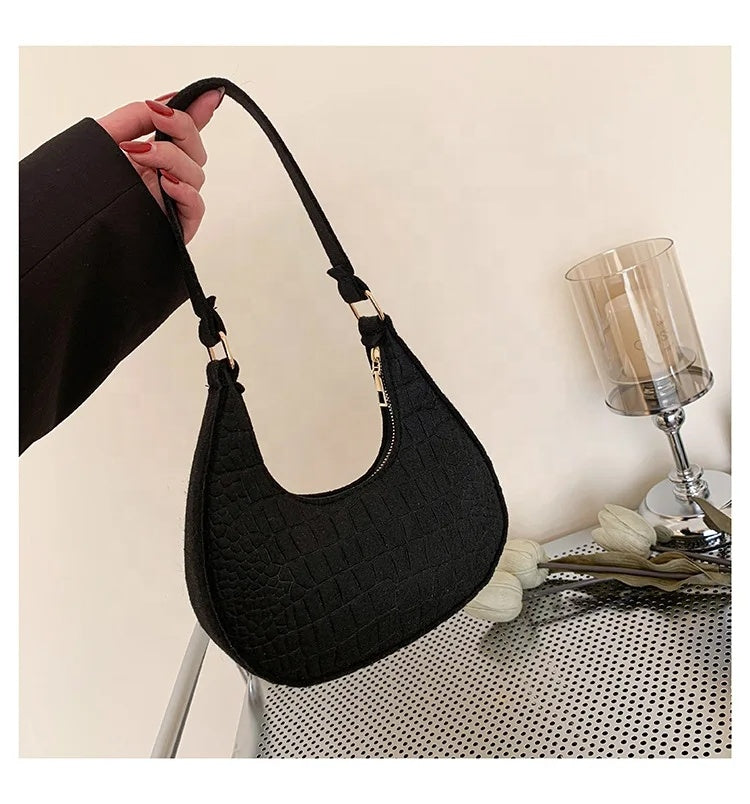 Mooc shape handbag in black