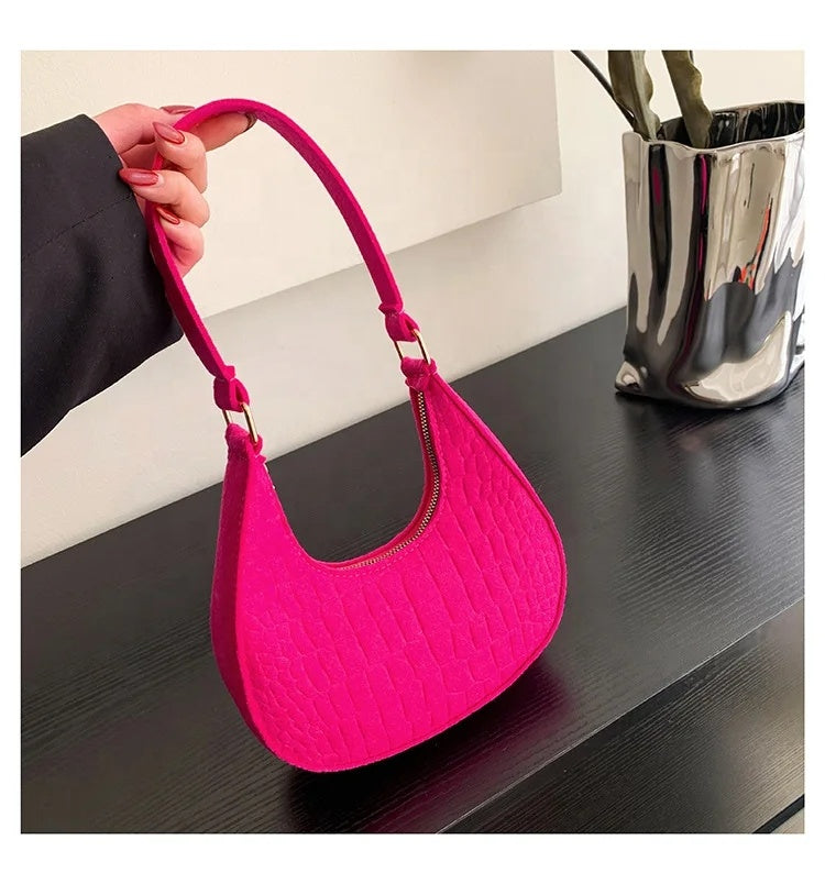 Mooc shape handbag in tea pink