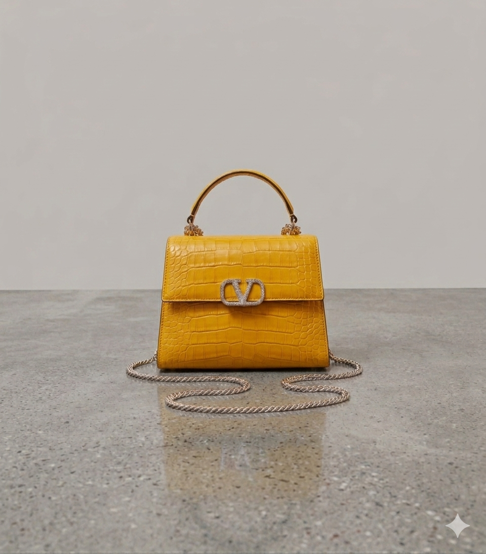 Crocodile textured handbag in yellow