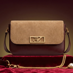 Crossbody bag with gold chain and flap closure